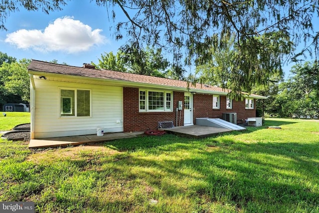 9377 General Winder Rd, Rapidan, VA 22733 - rear view of property with a yard, brick siding, and a chimney