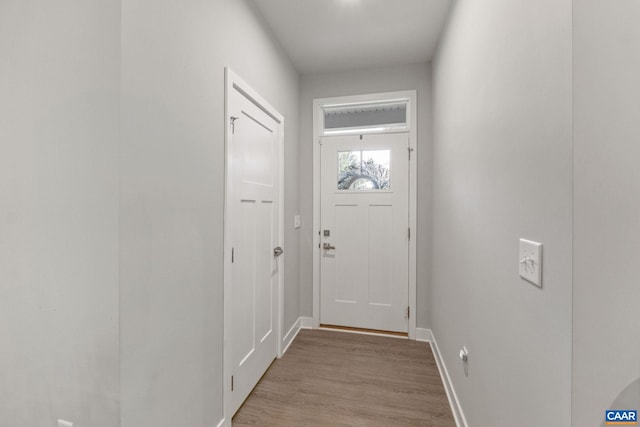 712 Empire St, Charlottesville, VA 22901 - doorway to outside with wood finished floors and baseboards