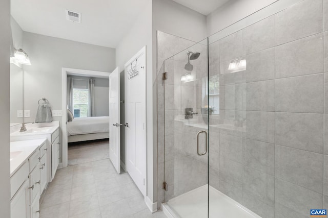 712 Empire St, Charlottesville, VA 22901 - ensuite bathroom with vanity, a stall shower, and tile patterned flooring