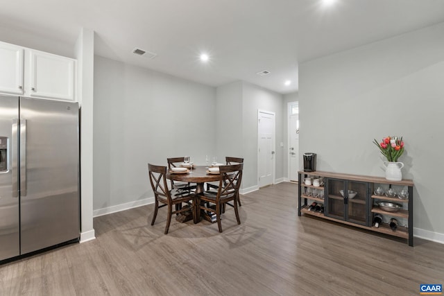 712 Empire St, Charlottesville, VA 22901 - dining space with light wood-style floors and recessed lighting