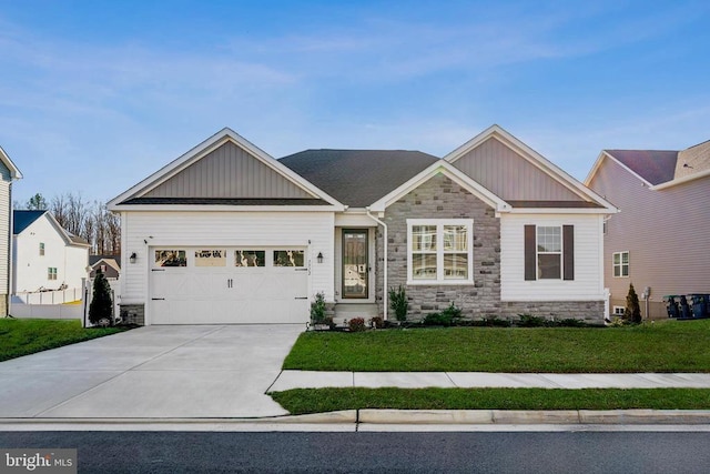 craftsman house with stone siding, board and batten siding, a front lawn, and a garage