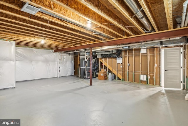 unfinished basement with stairway