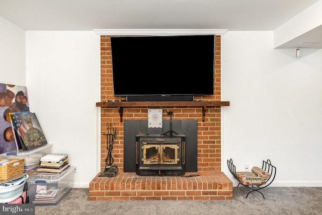 12016 Branchwater St, Fredericksburg, VA 22407 - detailed view of a wood stove, carpet, and baseboards