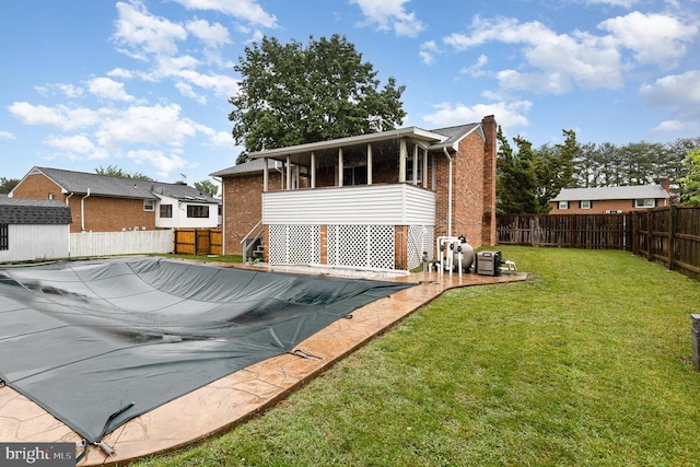 12016 Branchwater St, Fredericksburg, VA 22407 - rear view of house featuring brick siding and a sunroom