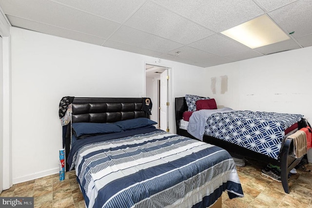 12016 Branchwater St, Fredericksburg, VA 22407 - bedroom featuring a drop ceiling, stone finish floors, and baseboards