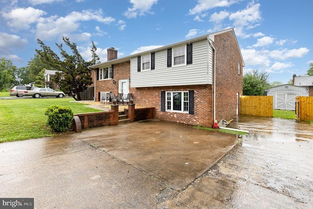 12016 Branchwater St, Fredericksburg, VA 22407 - view of front of house featuring brick siding and a chimney