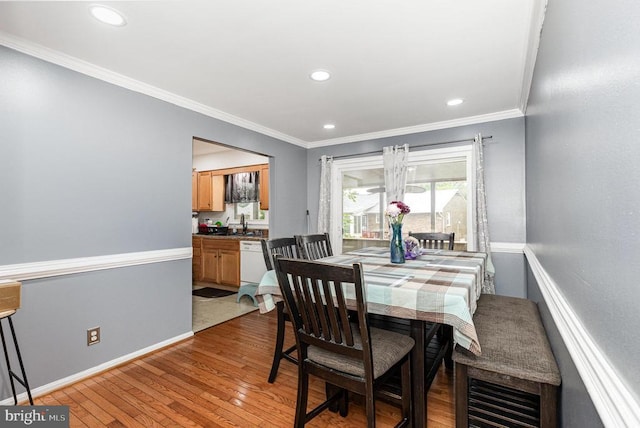 12016 Branchwater St, Fredericksburg, VA 22407 - dining space featuring light wood finished floors, crown molding, recessed lighting, and baseboards