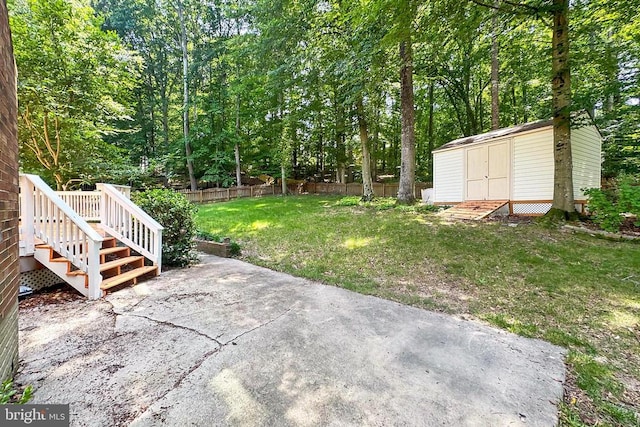 10409 Colechester St, Fredericksburg, VA 22408 - view of yard featuring a patio and a storage unit