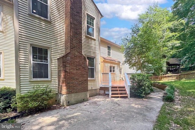 10409 Colechester St, Fredericksburg, VA 22408 - view of side of home with a deck and a patio area