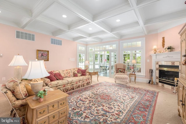 11306 Stonewall Jackson Dr, Spotsylvania, VA 22551 - living room featuring coffered ceiling, beamed ceiling, a tile fireplace, recessed lighting, and light colored carpet
