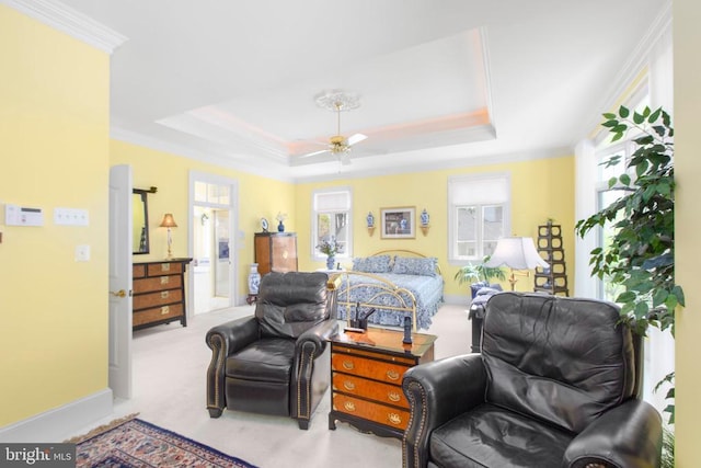 11306 Stonewall Jackson Dr, Spotsylvania, VA 22551 - carpeted bedroom with multiple windows, a tray ceiling, crown molding, and a ceiling fan