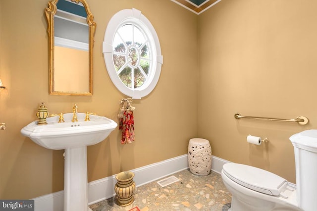 11306 Stonewall Jackson Dr, Spotsylvania, VA 22551 - half bath with toilet and baseboards