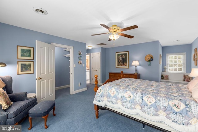 11306 Stonewall Jackson Dr, Spotsylvania, VA 22551 - bedroom with carpet flooring, a ceiling fan, and baseboards