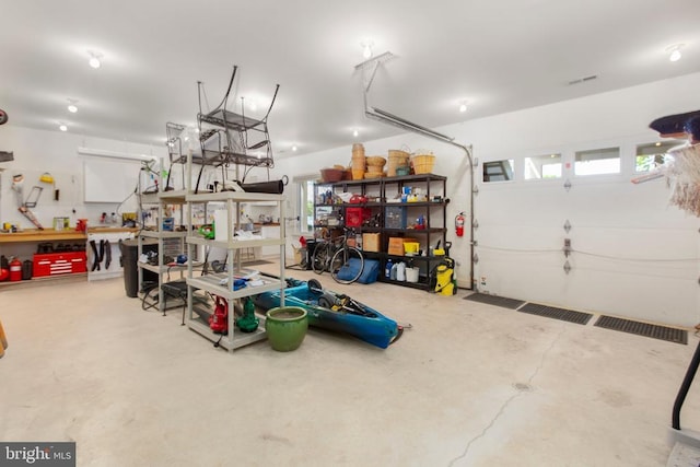 11306 Stonewall Jackson Dr, Spotsylvania, VA 22551 - garage with a workshop area