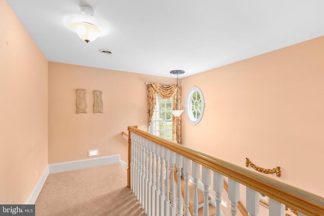 11306 Stonewall Jackson Dr, Spotsylvania, VA 22551 - hall featuring an upstairs landing, carpet floors, and baseboards