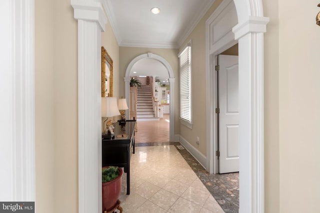 11306 Stonewall Jackson Dr, Spotsylvania, VA 22551 - hallway with ornate columns, crown molding, tile patterned floors, and recessed lighting