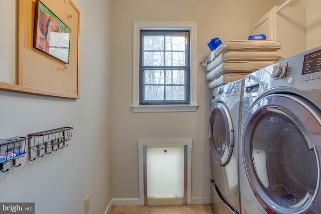 47 Marwood Dr, Palmyra, VA 22963 - clothes washing area featuring washing machine and clothes dryer, laundry area, and baseboards