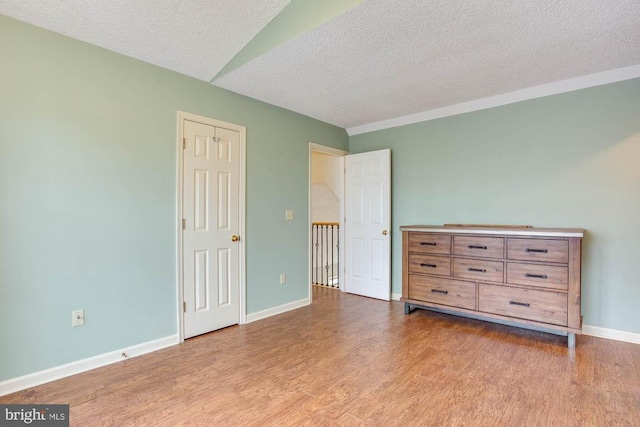 47 Marwood Dr, Palmyra, VA 22963 - bedroom featuring a textured ceiling, wood finished floors, and baseboards