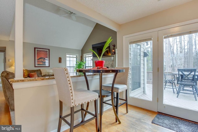 47 Marwood Dr, Palmyra, VA 22963 - dining area featuring light wood-style floors, lofted ceiling, ceiling fan, and a textured ceiling