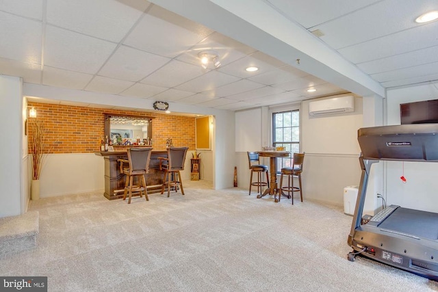 47 Marwood Dr, Palmyra, VA 22963 - workout area featuring a paneled ceiling, a wall mounted AC, carpet, and a dry bar