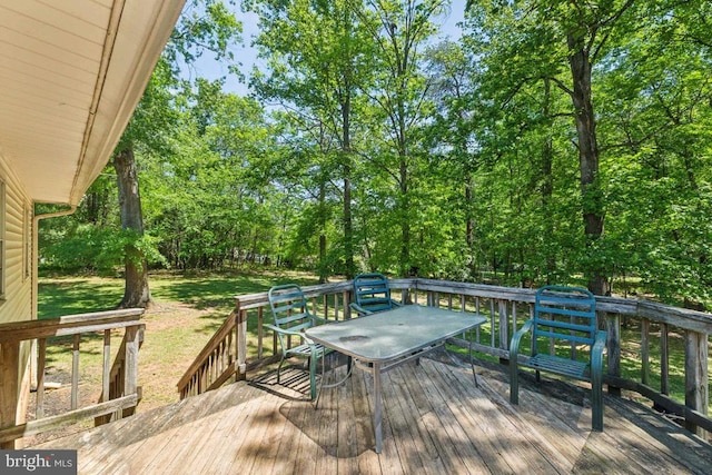  - wooden terrace featuring a lawn