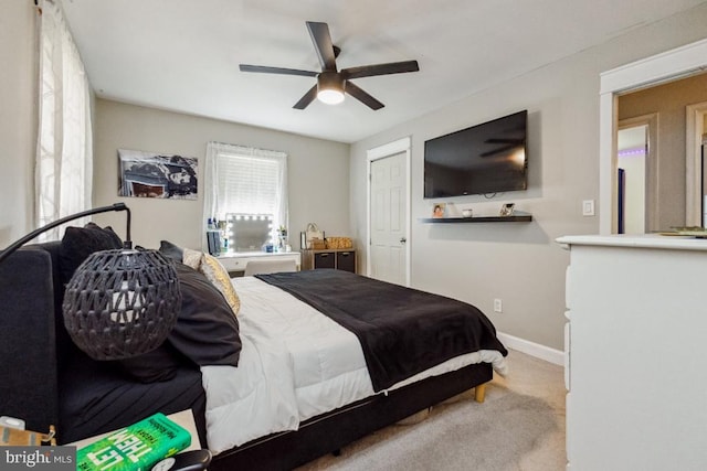  - bedroom featuring carpet floors, ceiling fan, and baseboards