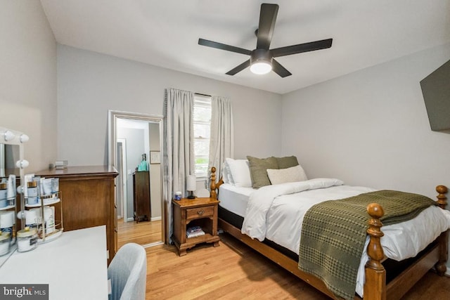  - bedroom featuring light wood-type flooring and a ceiling fan