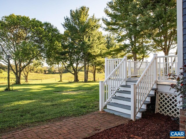 view of yard with a wooden deck