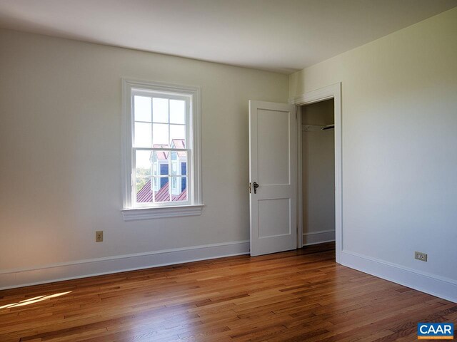 unfurnished bedroom featuring hardwood / wood-style floors