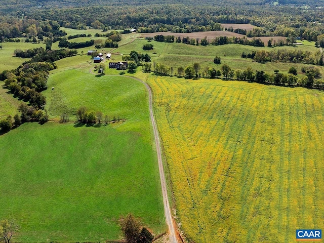 birds eye view of property featuring a rural view