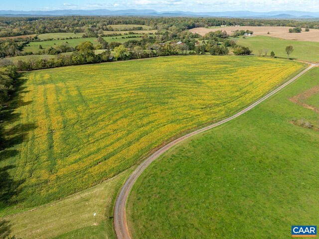 aerial view with a mountain view and a rural view