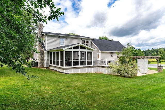 17962 Old Barn Ln, Elkton, VA 22827 - back of property with a chimney, a sunroom, and a yard