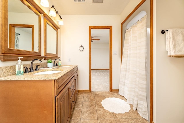 17962 Old Barn Ln, Elkton, VA 22827 - bathroom featuring double vanity, tile patterned flooring, and a ceiling fan