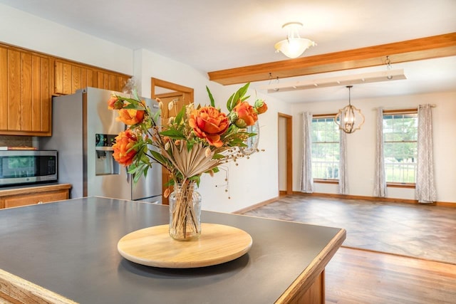 17962 Old Barn Ln, Elkton, VA 22827 - dining space featuring beamed ceiling and a chandelier