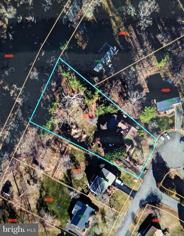  - aerial map of property and surrounding area featuring property parcel outlined