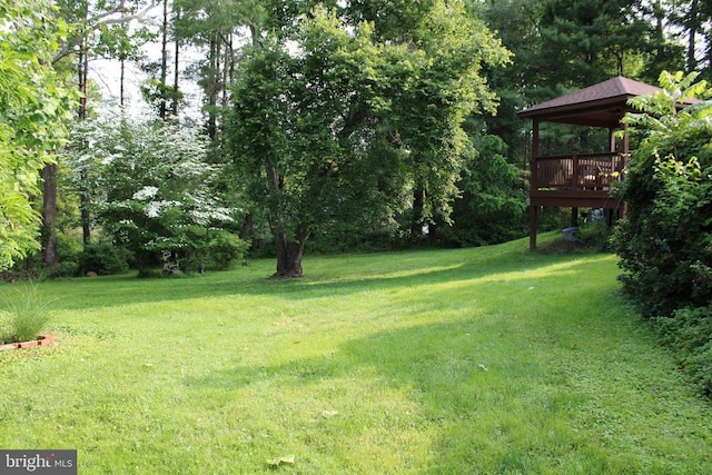  - view of green lawn with a gazebo