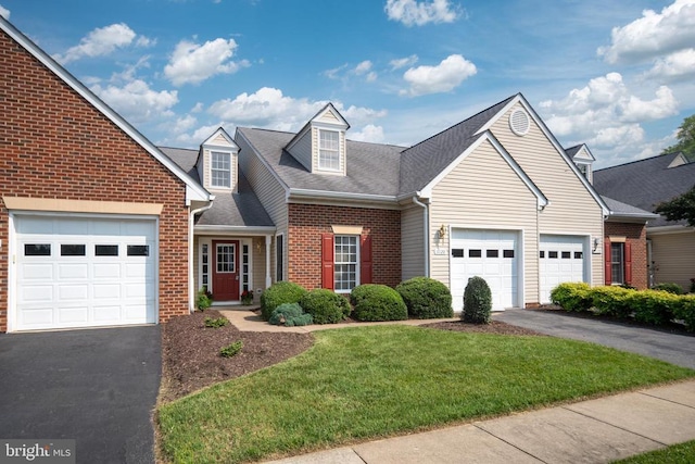 11120 Dragons Lair Dr, Fredericksburg, VA 22407 - view of front of house featuring asphalt driveway, an attached garage, brick siding, a front lawn, and roof with shingles