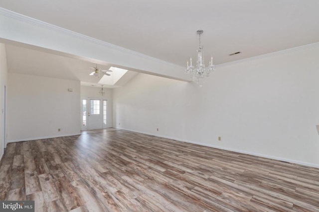 11120 Dragons Lair Dr, Fredericksburg, VA 22407 - spare room featuring a chandelier, wood finished floors, a ceiling fan, and ornamental molding