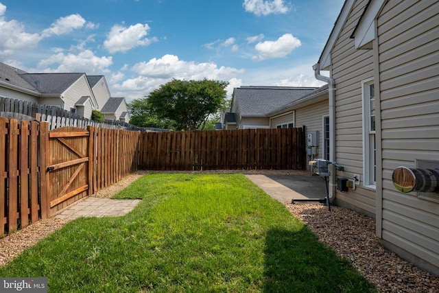 11120 Dragons Lair Dr, Fredericksburg, VA 22407 - fenced backyard featuring a patio area and a gate