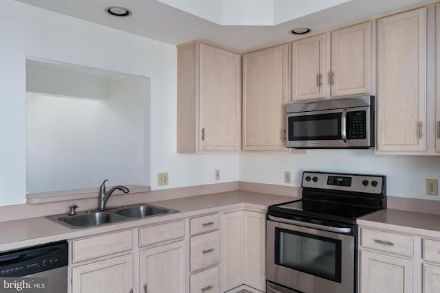 11120 Dragons Lair Dr, Fredericksburg, VA 22407 - kitchen with stainless steel appliances, light brown cabinets, and light countertops