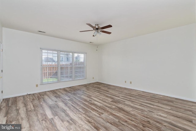11120 Dragons Lair Dr, Fredericksburg, VA 22407 - spare room featuring a ceiling fan and wood finished floors