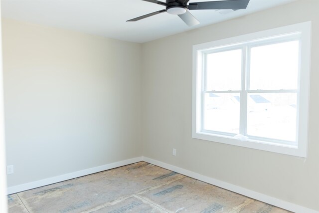 unfurnished room with ceiling fan