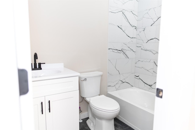 full bathroom with vanity, toilet, and tiled shower / bath combo