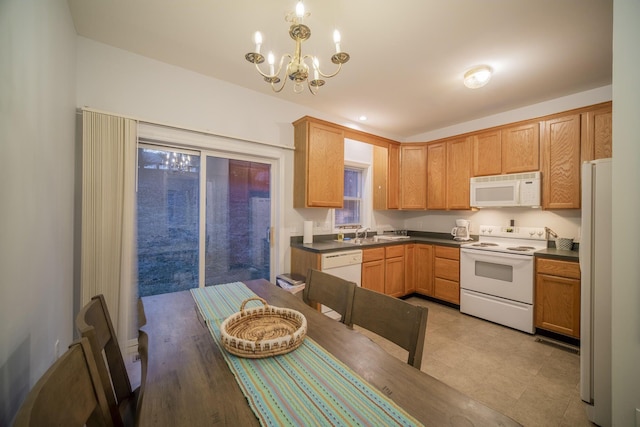 25-4 Beverly Ct Unit 25-4, Lexington, VA 24450 - kitchen featuring white appliances, a chandelier, and dark countertops