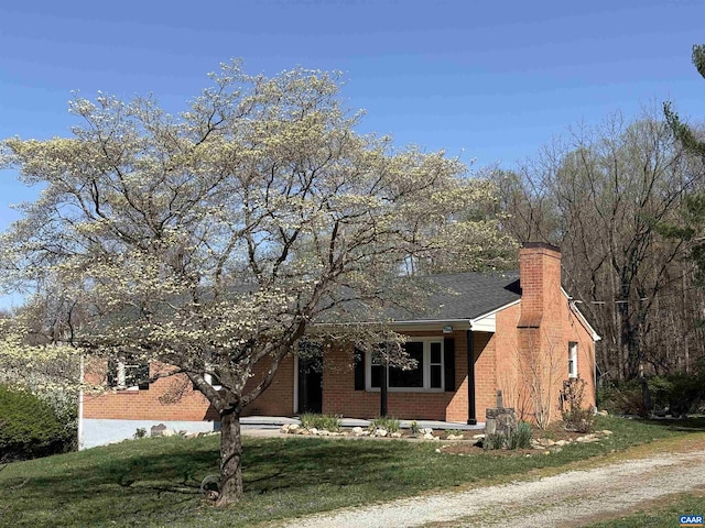 16772 Patrick Henry Hwy, Roseland, VA 22967 - view of front of house featuring brick siding, a chimney, and a front lawn