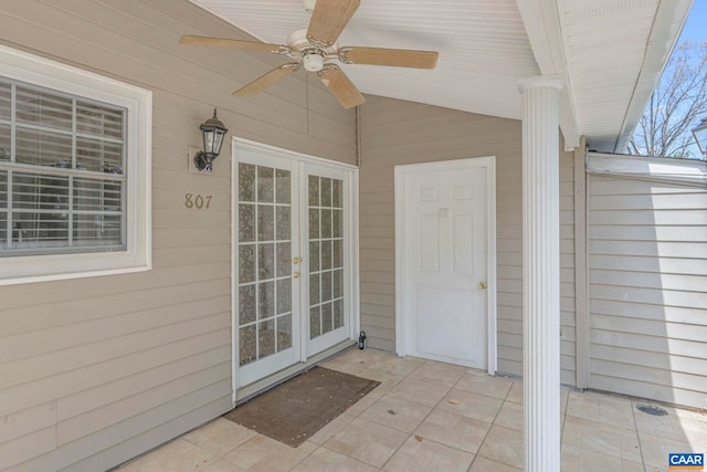view of exterior entry featuring french doors and ceiling fan