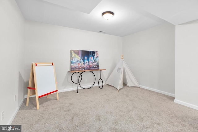 playroom featuring carpet and baseboards