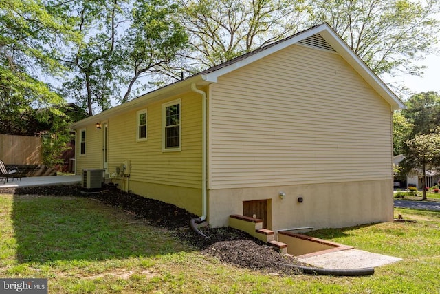 view of property exterior featuring a yard