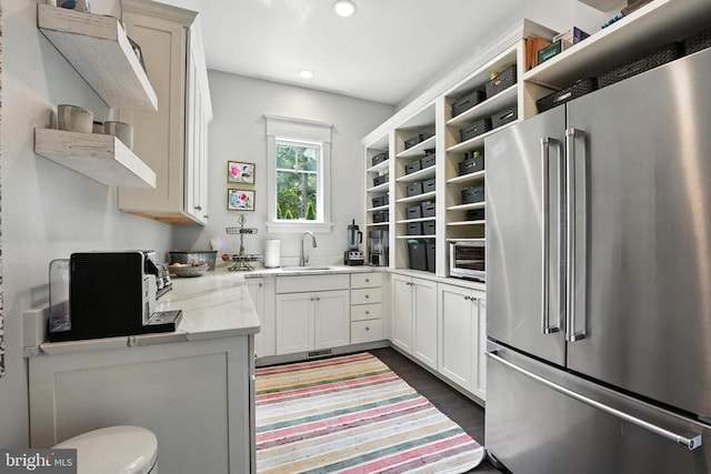 11109 Vanderbilt Cv, Spotsylvania, VA 22551 - kitchen featuring high end refrigerator, open shelves, light countertops, recessed lighting, and dark wood-style floors
