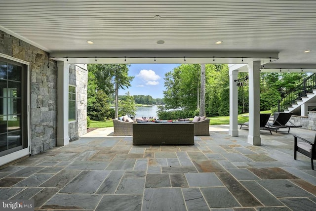 11109 Vanderbilt Cv, Spotsylvania, VA 22551 - view of patio with outdoor lounge area, a water view, and stairway